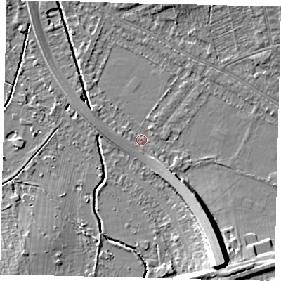 Shaded relief map of the ground around SW200AQ, computed from Environment Agency LiDAR. The ground here sits at about 13 m above sea level and falls 15 m across the surrounding 800 m. Surface water reaching this point runs off ground lying to the south-east, 3.1 m higher.