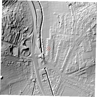 Shaded relief map of the ground around SW200RL, computed from Environment Agency LiDAR. The ground here sits at about 13 m above sea level and falls 22 m across the surrounding 800 m. Surface water reaching this point runs off ground lying to the east-north-east, 5.7 m higher.