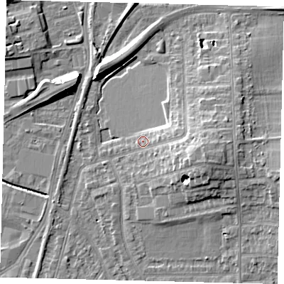 Shaded relief map of the ground around SW209AT, computed from Environment Agency LiDAR. The ground here sits at about 16 m above sea level and falls 11 m across the surrounding 800 m. Surface water reaching this point runs off ground lying to the east-south-east, 7.7 m higher.