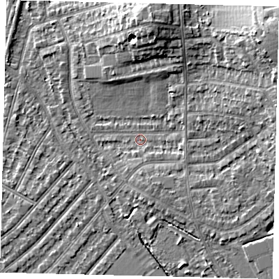 Shaded relief map of the ground around SW209BH, computed from Environment Agency LiDAR. The ground here sits at about 16 m above sea level and falls 11 m across the surrounding 800 m. Surface water reaching this point runs off ground lying to the north-east, 9.1 m higher.