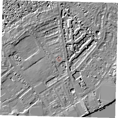Shaded relief map of the ground around SW63AX, computed from Environment Agency LiDAR. The ground here sits at about 4 m above sea level and falls 9 m across the surrounding 800 m. Surface water reaching this point runs off ground lying to the south-south-east, 7.4 m higher.