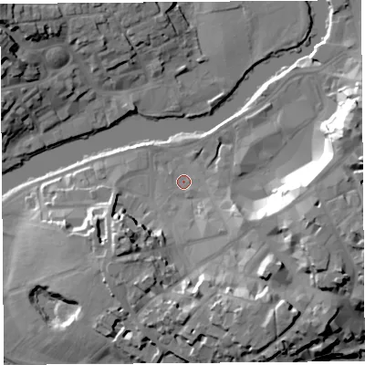 Shaded relief map of the ground around SY11PS, computed from Environment Agency LiDAR. The ground here sits at about 53 m above sea level and falls 24 m across the surrounding 800 m. Surface water reaching this point runs off ground lying to the south-east, 1.5 m higher.