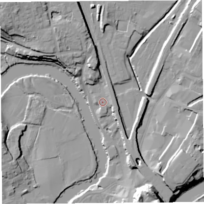 Shaded relief map of the ground around SY12DL, computed from Environment Agency LiDAR. The ground here sits at about 54 m above sea level and falls 25 m across the surrounding 800 m. Surface water reaching this point runs off ground lying to the north-north-west, 9.4 m higher.