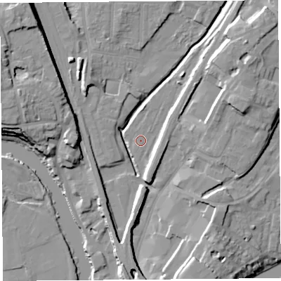 Shaded relief map of the ground around SY12EB, computed from Environment Agency LiDAR. The ground here sits at about 52 m above sea level and falls 16 m across the surrounding 800 m. The ground contributing surface water to this point lies to the north-east.