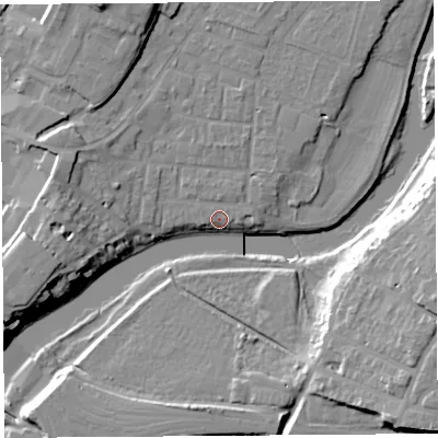 Shaded relief map of the ground around SY12JD, computed from Environment Agency LiDAR. The ground here sits at about 52 m above sea level and falls 18 m across the surrounding 800 m. Surface water reaching this point runs off ground lying to the west-north-west, 1.6 m higher.