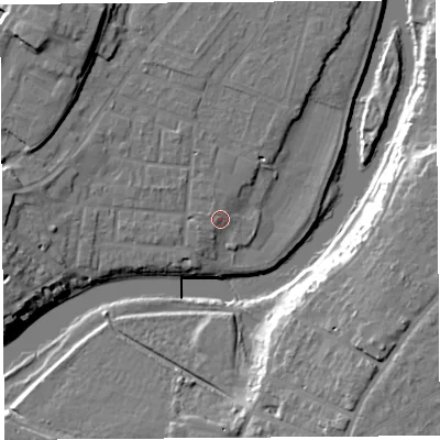 Shaded relief map of the ground around SY12JS, computed from Environment Agency LiDAR. The ground here sits at about 52 m above sea level and falls 18 m across the surrounding 800 m. Surface water reaching this point runs off ground lying to the west-south-west, 1.7 m higher.