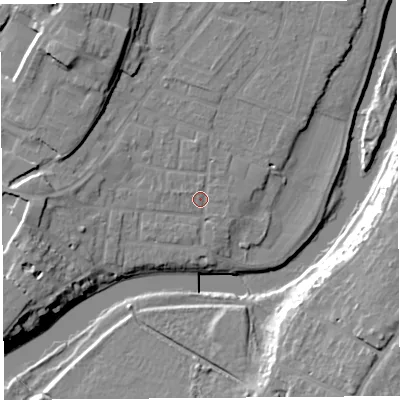 Shaded relief map of the ground around SY12JT, computed from Environment Agency LiDAR. The ground here sits at about 52 m above sea level and falls 18 m across the surrounding 800 m. Surface water reaching this point runs off ground lying to the west-south-west, 8.1 m higher.