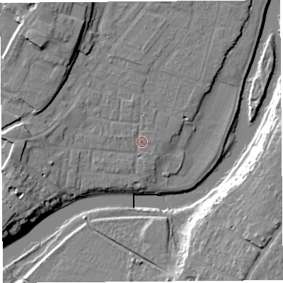 Shaded relief map of the ground around SY12JU, computed from Environment Agency LiDAR. The ground here sits at about 52 m above sea level and falls 18 m across the surrounding 800 m. Surface water reaching this point runs off ground lying to the west-south-west, 8.1 m higher.