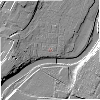 Shaded relief map of the ground around SY12JW, computed from Environment Agency LiDAR. The ground here sits at about 53 m above sea level and falls 17 m across the surrounding 800 m. Surface water reaching this point runs off ground lying to the west, 1.6 m higher.