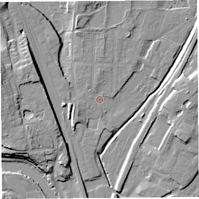 Shaded relief map of the ground around SY12PN, computed from Environment Agency LiDAR. The ground here sits at about 52 m above sea level and falls 18 m across the surrounding 800 m. Surface water reaching this point runs off ground lying to the north, 2.9 m higher.