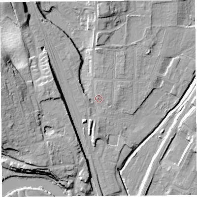 Shaded relief map of the ground around SY12PR, computed from Environment Agency LiDAR. The ground here sits at about 54 m above sea level and falls 22 m across the surrounding 800 m. Surface water reaching this point runs off ground lying to the north, 9.7 m higher.