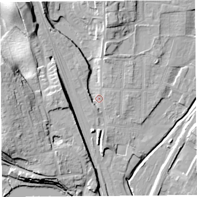 Shaded relief map of the ground around SY12PT, computed from Environment Agency LiDAR. The ground here sits at about 53 m above sea level and falls 23 m across the surrounding 800 m. Surface water reaching this point runs off ground lying to the north-north-west, 11.1 m higher.