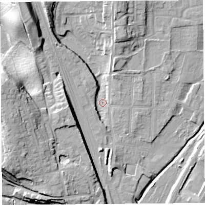 Shaded relief map of the ground around SY12PU, computed from Environment Agency LiDAR. The ground here sits at about 52 m above sea level and falls 23 m across the surrounding 800 m. Surface water reaching this point runs off ground lying to the north-north-west, 13.2 m higher.