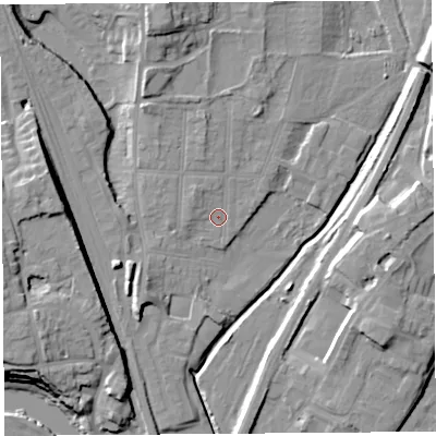Shaded relief map of the ground around SY12QF, computed from Environment Agency LiDAR. The ground here sits at about 53 m above sea level and falls 16 m across the surrounding 800 m. Surface water reaching this point runs off ground lying to the north-west, 2.1 m higher.