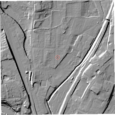 Shaded relief map of the ground around SY12QG, computed from Environment Agency LiDAR. The ground here sits at about 53 m above sea level and falls 16 m across the surrounding 800 m. Surface water reaching this point runs off ground lying to the west-north-west, 1.9 m higher.