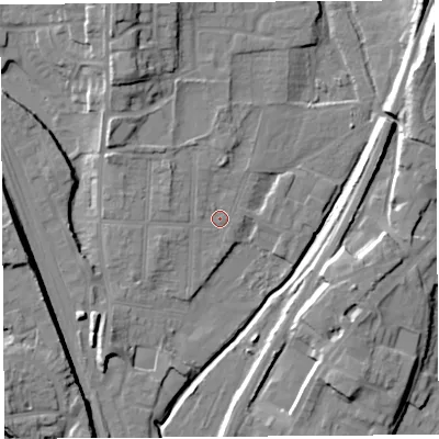 Shaded relief map of the ground around SY12QJ, computed from Environment Agency LiDAR. The ground here sits at about 53 m above sea level and falls 16 m across the surrounding 800 m. Surface water reaching this point runs off ground lying to the west-north-west, 3.1 m higher.