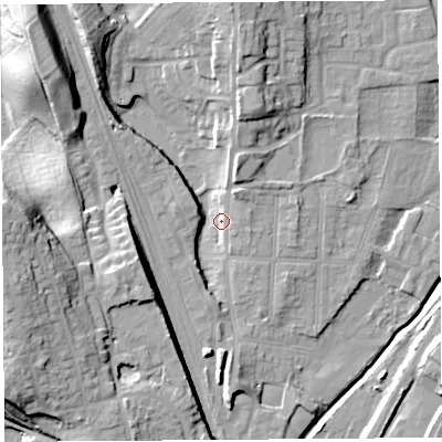 Shaded relief map of the ground around SY12QR, computed from Environment Agency LiDAR. The ground here sits at about 53 m above sea level and falls 23 m across the surrounding 800 m. Surface water reaching this point runs off ground lying to the north-west, 13.6 m higher.