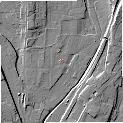 Shaded relief map of the ground around SY12QW, computed from Environment Agency LiDAR. The ground here sits at about 53 m above sea level and falls 16 m across the surrounding 800 m. Surface water reaching this point runs off ground lying to the west-north-west, 3.1 m higher.