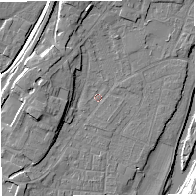 Shaded relief map of the ground around SY12SH, computed from Environment Agency LiDAR. The ground here sits at about 52 m above sea level and falls 16 m across the surrounding 800 m. Surface water reaching this point runs off ground lying to the west-south-west, 9.6 m higher.