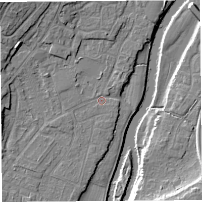 Shaded relief map of the ground around SY12SP, computed from Environment Agency LiDAR. The ground here sits at about 51 m above sea level and falls 17 m across the surrounding 800 m. Surface water reaching this point runs off ground lying to the north-west, 9.4 m higher.