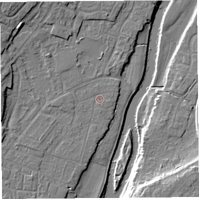 Shaded relief map of the ground around SY12TW, computed from Environment Agency LiDAR. The ground here sits at about 51 m above sea level and falls 16 m across the surrounding 800 m. Surface water reaching this point runs off ground lying to the north-west, 7.7 m higher.