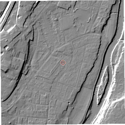 Shaded relief map of the ground around SY12TY, computed from Environment Agency LiDAR. The ground here sits at about 52 m above sea level and falls 16 m across the surrounding 800 m. Surface water reaching this point runs off ground lying to the west, 0.7 m higher.