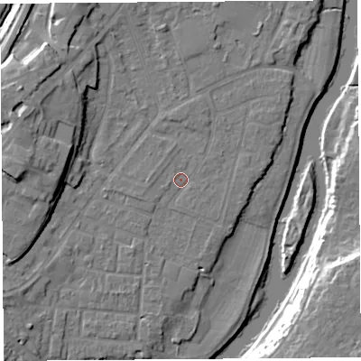 Shaded relief map of the ground around SY12UA, computed from Environment Agency LiDAR. The ground here sits at about 52 m above sea level and falls 17 m across the surrounding 800 m. Surface water reaching this point runs off ground lying to the west-south-west, 1.4 m higher.