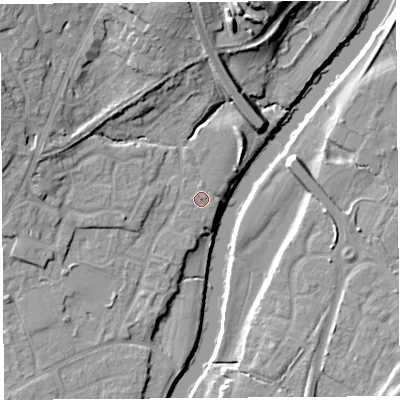 Shaded relief map of the ground around SY12UL, computed from Environment Agency LiDAR. The ground here sits at about 52 m above sea level and falls 18 m across the surrounding 800 m. The ground contributing surface water to this point lies to the west-south-west.
