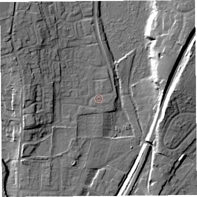Shaded relief map of the ground around SY13SR, computed from Environment Agency LiDAR. The ground here sits at about 53 m above sea level and falls 16 m across the surrounding 800 m. Surface water reaching this point runs off ground lying to the north-west, 11.7 m higher.