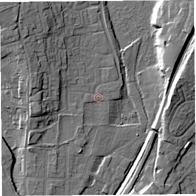Shaded relief map of the ground around SY13ST, computed from Environment Agency LiDAR. The ground here sits at about 54 m above sea level and falls 16 m across the surrounding 800 m. Surface water reaching this point runs off ground lying to the east-south-east, 0.7 m higher.