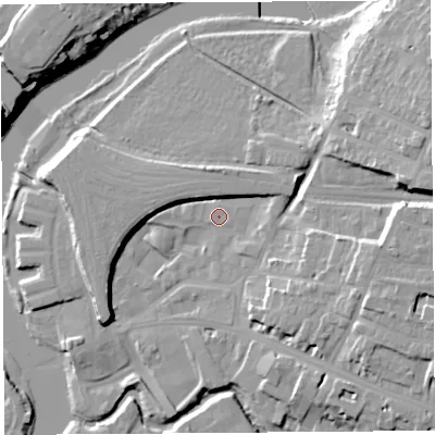 Shaded relief map of the ground around SY25DE, computed from Environment Agency LiDAR. The ground here sits at about 52 m above sea level and falls 18 m across the surrounding 800 m. Surface water reaching this point runs off ground lying to the south-east, 1.6 m higher.