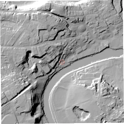 Shaded relief map of the ground around SY38JH, computed from Environment Agency LiDAR. The ground here sits at about 52 m above sea level and falls 33 m across the surrounding 800 m. Surface water reaching this point runs off ground lying to the west-north-west, 20.2 m higher.