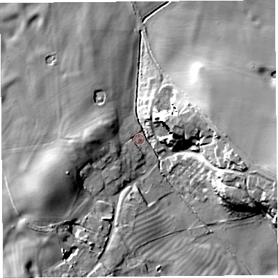 Shaded relief map of the ground around SY43SD, computed from Environment Agency LiDAR. The ground here sits at about 89 m above sea level and falls 22 m across the surrounding 800 m. Surface water reaching this point runs off ground lying to the east-north-east, 14.2 m higher.