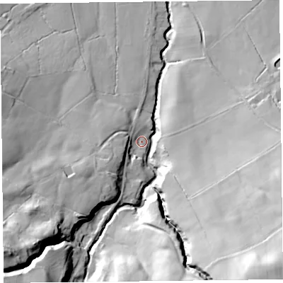 Shaded relief map of the ground around SY50HU, computed from Environment Agency LiDAR. The ground here sits at about 135 m above sea level and falls 65 m across the surrounding 800 m. Surface water reaching this point runs off ground lying to the south-west, 18.0 m higher.