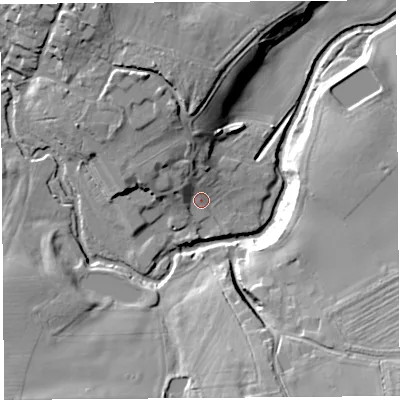 Shaded relief map of the ground around SY57BG, computed from Environment Agency LiDAR. The ground here sits at about 77 m above sea level and falls 22 m across the surrounding 800 m. Surface water reaching this point runs off ground lying to the north-west, 7.8 m higher.