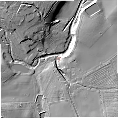 Shaded relief map of the ground around SY57BT, computed from Environment Agency LiDAR. The ground here sits at about 77 m above sea level and falls 28 m across the surrounding 800 m. Surface water reaching this point runs off ground lying to the south-east, 24.4 m higher.
