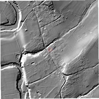 Shaded relief map of the ground around SY84DB, computed from Environment Agency LiDAR. The ground here sits at about 75 m above sea level and falls 24 m across the surrounding 800 m. Surface water reaching this point runs off ground lying to the south-east, 9.8 m higher.