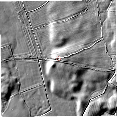 Shaded relief map of the ground around SY95DT, computed from Environment Agency LiDAR. The ground here sits at about 186 m above sea level and falls 15 m across the surrounding 800 m. Surface water reaching this point runs off ground lying to the east-north-east, 2.7 m higher.