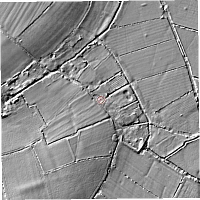 Shaded relief map of the ground around TA100DJ, computed from Environment Agency LiDAR. The ground here sits at about 9 m above sea level and falls 6 m across the surrounding 800 m. Surface water reaching this point runs off ground lying to the south-west, 1.8 m higher.