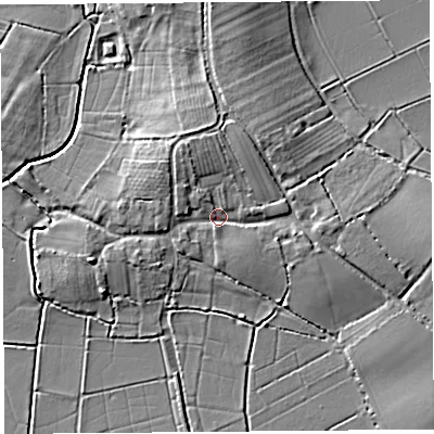 Shaded relief map of the ground around TA100DL, computed from Environment Agency LiDAR. The ground here sits at about 9 m above sea level and falls 7 m across the surrounding 800 m. Surface water reaching this point runs off ground lying to the north-north-west, 3.8 m higher.