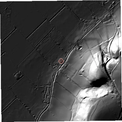 Shaded relief map of the ground around TA100PJ, computed from Environment Agency LiDAR. The ground here sits at about 7 m above sea level and falls 75 m across the surrounding 800 m. Surface water reaching this point runs off ground lying to the south-east, 2.3 m higher.