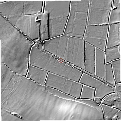 Shaded relief map of the ground around TA100QT, computed from Environment Agency LiDAR. The ground here sits at about 5 m above sea level and falls 12 m across the surrounding 800 m. Surface water reaching this point runs off ground lying to the south-south-east, 11.6 m higher.
