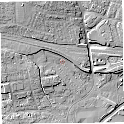 Shaded relief map of the ground around TA11BE, computed from Environment Agency LiDAR. The ground here sits at about 16 m above sea level and falls 14 m across the surrounding 800 m. Surface water reaching this point runs off ground lying to the west, 6.2 m higher.