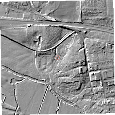 Shaded relief map of the ground around TA11ER, computed from Environment Agency LiDAR. The ground here sits at about 18 m above sea level and falls 12 m across the surrounding 800 m. Surface water reaching this point runs off ground lying to the north, 9.4 m higher.