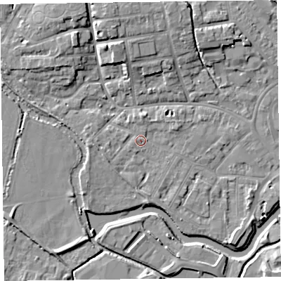 Shaded relief map of the ground around TA11XE, computed from Environment Agency LiDAR. The ground here sits at about 16 m above sea level and falls 8 m across the surrounding 800 m. Surface water reaching this point runs off ground lying to the south, 1.5 m higher.