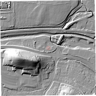 Shaded relief map of the ground around TA12DX, computed from Environment Agency LiDAR. The ground here sits at about 12 m above sea level and falls 35 m across the surrounding 800 m. Surface water reaching this point runs off ground lying to the west-south-west, 4.7 m higher.