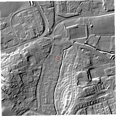 Shaded relief map of the ground around TA12JJ, computed from Environment Agency LiDAR. The ground here sits at about 15 m above sea level and falls 14 m across the surrounding 800 m. Surface water reaching this point runs off ground lying to the south-south-east, 12.8 m higher.