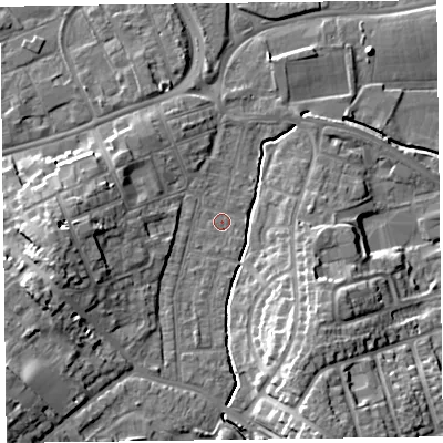 Shaded relief map of the ground around TA12JL, computed from Environment Agency LiDAR. The ground here sits at about 16 m above sea level and falls 15 m across the surrounding 800 m. Surface water reaching this point runs off ground lying to the west-south-west, 9.2 m higher.
