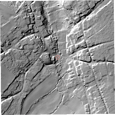 Shaded relief map of the ground around TA135BS, computed from Environment Agency LiDAR. The ground here sits at about 33 m above sea level and falls 22 m across the surrounding 800 m. Surface water reaching this point runs off ground lying to the west, 18.5 m higher.