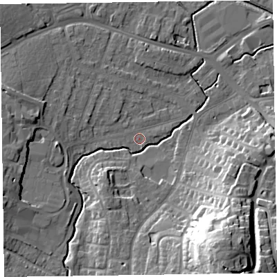 Shaded relief map of the ground around TA15BX, computed from Environment Agency LiDAR. The ground here sits at about 18 m above sea level and falls 32 m across the surrounding 800 m. Surface water reaching this point runs off ground lying to the west, 3.4 m higher.